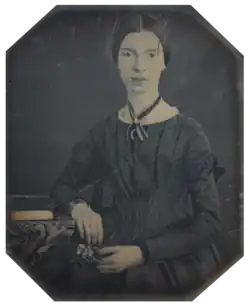 Photograph of Emily Dickinson, seated, at the age of 16