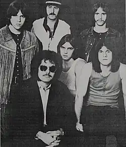 Bloodrock in 1970. Clockwise from top: Lee Pickens, Stevie Hill, Rick Cobb, Ed Grundy, Nick Taylor, and Jim Rutledge.