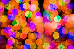 An example of the bokeh produced by the Canon 85&nbsp;mm prime f/1.8 lens. The polygonal shapes are due to the 8-bladed aperture diaphragm being slightly closed. At its full aperture (f/1.8) these shapes would be smooth and not polygonal.