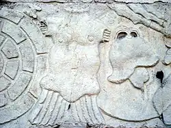 Roman tombstone on the facade of the Mount of Piety