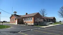 The side view showing the 1910 addition to the original structure