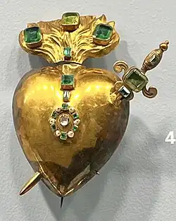 A gold brooch representing the Immaculate Heart of Mary (ca 1874)