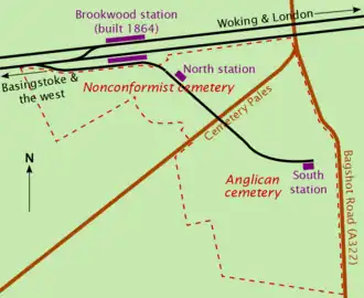 Irregularly shaped plot of land, with a railway line and station as the top boundary. A road marked "Cemetery Pales" bisects the plot of land into sections marked "Nonconformist" and "Anglican". A branch from the railway line runs through these two sections, with a station roughly in the centre of each.