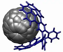 An example of molecular tweezers binding a fullerene