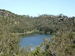 Heavily forested Budj Bim with a lake in the middle.