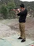 Plinking with a Ruger 10/22 rifle in Burro Canyon, Arizona, US