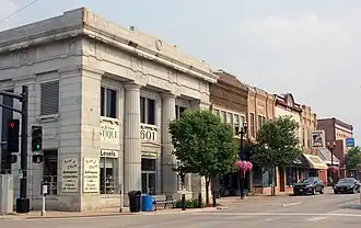 Businesses on southwest corner of Broadway Street at 6th Avenue