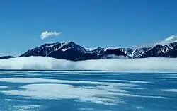 Byam Martin Mountains viewed from the foggy sea