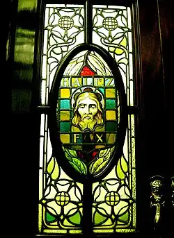 Committee room door panel made 1901, with face of John the Baptist