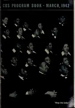 Magazine cover with a photo of many choir members