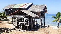 Cang‑Isok house in the town of Enrique Villanueva, a century-old house built on stilts that withstood ravages brought about by time and nature