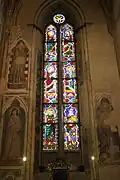 Window depicting the Appearance of the Angels, designed by Jacopo del Casentino and created by an unknown glazier, ca. 1321-30. Originally located in the Velluti chapel; moved ca. 1945 to the Bardi chapel, where it is currently located.
