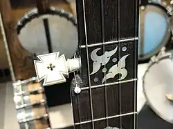 Carved ivory tuner from Fairbanks & Cole Le Grande Imperial banjo, 1889, American Banjo Museum