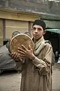 An Egyptian adolescent playing the riqq