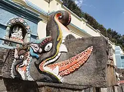 Hiti Manga in the Balaju Water Garden. Almost all stone taps in Nepal depict this Makara