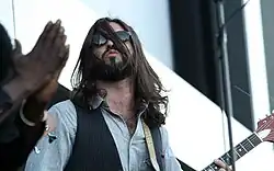 Brenneck playing guitar