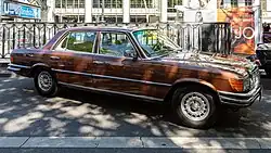 Older red four-door sedan