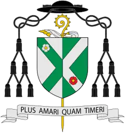 Coat of arms of Paulinus Greenwood, Abbot of St Augustine's Abbey with black galero