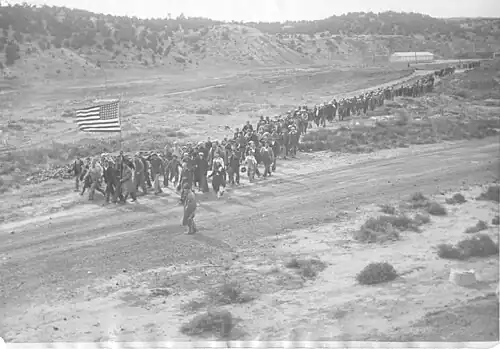 Striking workers and family marching earlier on November 3