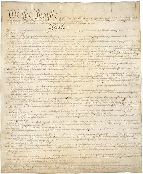 Image of handwritten copy of the Constitution.