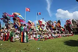 The Assumption feast in front of the palace with the two flags, that of France and that of Wallis and Futuna.