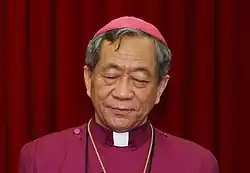 Bishop David Jung-Hsin Lai praying during a 2014 event.