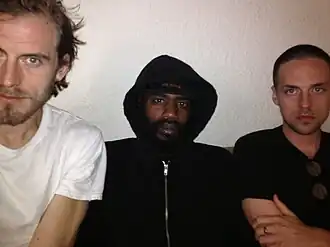 Death Grips in January 2014: Zach Hill, Stefan Burnett, Andy Morin