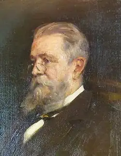 seated man in Victorian suit