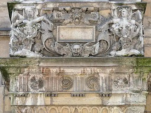 Renaissance cartouche on the Hôtel Bénigne Le Compasseur (Rue Vannerie no. 64), Dijon, France, unknown architect, 1570[6]