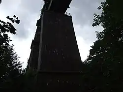 A brick strengthening pier from below