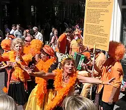 Revellers dressed in orange in Amsterdam, Koninginnedag 2007