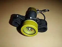 Small dive light on soft Goodman type handle, front view