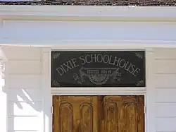 Dixie Schoolhouse sign over door