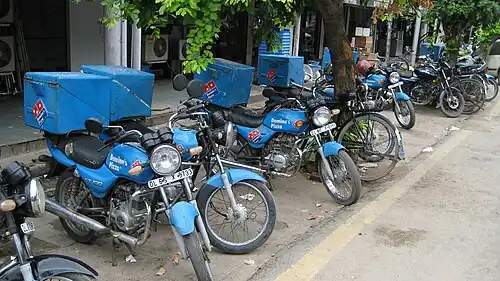 Domino's delivery motorcycles in Noida, Uttar Pradesh