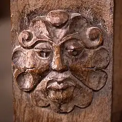 Wood carving of a "foliate head" type on Renaissance screen at Dore Abbey.