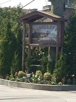 Douglaston Manor entrance sign