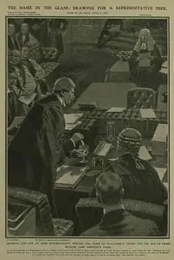 In a parliamentary setting, a number of men look on as a man takes a small piece of paper from a glass
