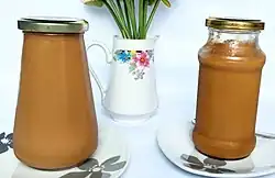 Dulce de leche in glass jars