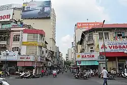Shophouses with mostly are foreign exchange agencies on Phan Châu Trinh Street and a small Halal district on Nguyễn An Ninh Street (West Gate of Bến Thành Market area)