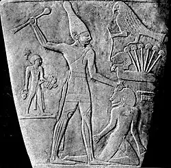 The Narmer Palette, Pharaoh Narmer subduing an enemy