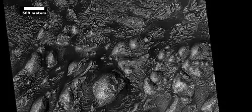 Layers in Firsoff Crater, as seen by HiRISE under HiWish program Note: this image field can be found in the previous image of the layers in Firsoff Crater, as seen by CTX camera (on Mars Reconnaissance Orbiter).