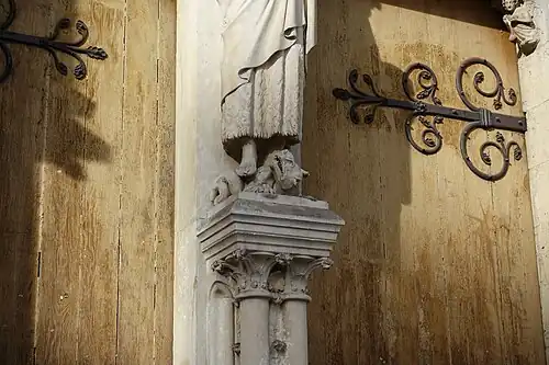 The Saint stepping on a devil