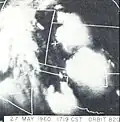 TIROS I image showing bright clouds with relatively well-defined edges and isolated from a main cloud mass. Shortly after this photograph, the southernmost cloud spawned a tornado (May 27, 1960).