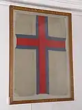 The prototype of the Faroese flag Merkið, which is hanging inside the church