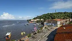 Porto de Pedras with its lighthouse in the background