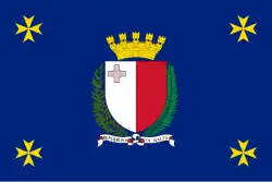 The Presidential Flag of Malta was introduced by a proclamation dated 12 December 1988. This flag is flown on the President's official residences and offices and on all occasions at which the president is present. It has the same proportions as the National Flag and consists of a blue field with the Emblem of Malta at its centre; and a Maltese Cross in gold in each corner.