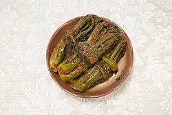 Gat-kimchi plated by wrapping some stalks around others