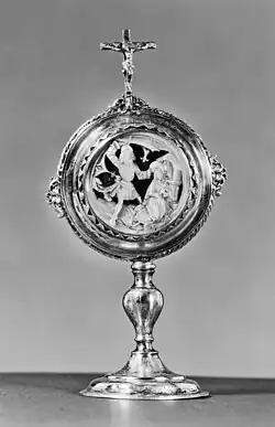 Mother of pearl medallion, after a print by Master E.S., c. 1480, mounted in silver as a pax in 17th century