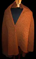 Replica of the Pre Roman Iron Age Gerum Cape found in a bog on the table mountain Gerumsberget, Falbygden