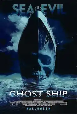 A front view of a ship with a ghostly skull superimpose on the hull